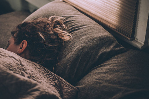 Lady sleeping in bed