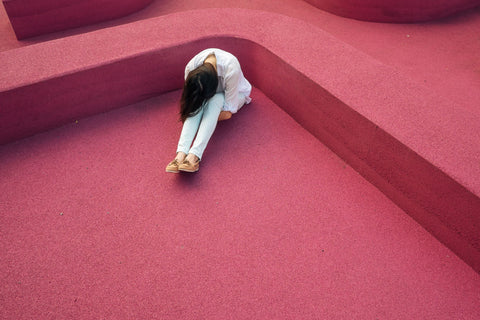 woman sitting alone